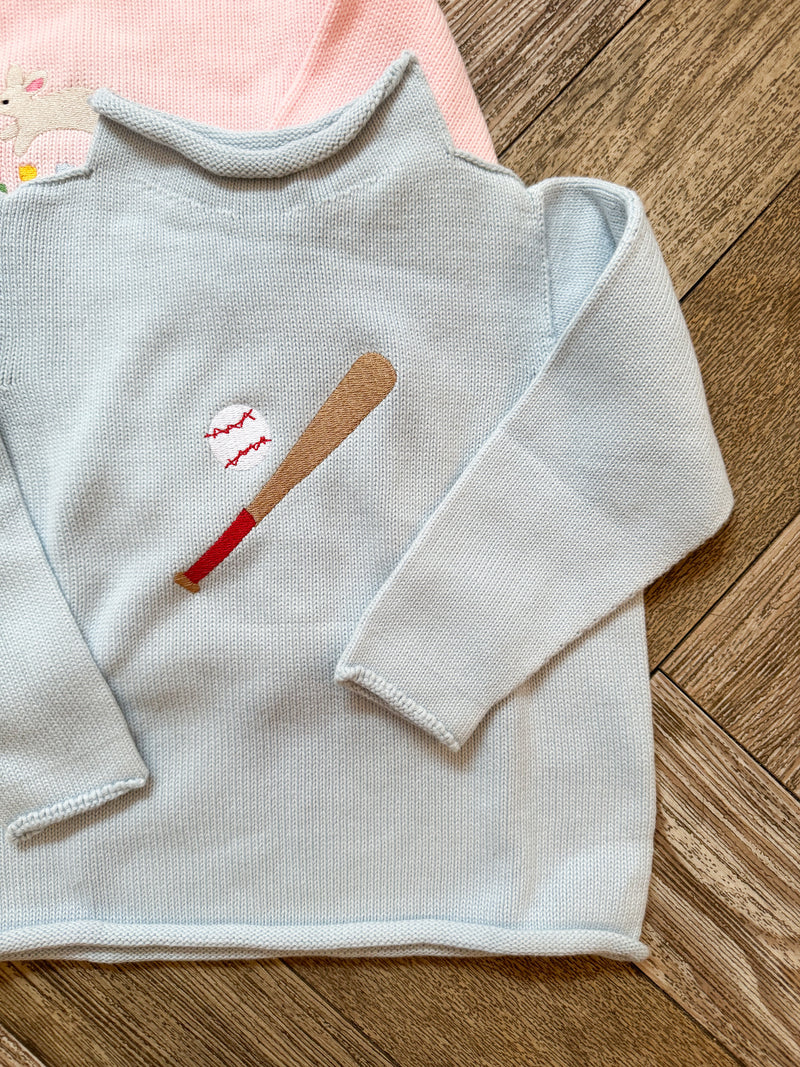 A Soft Idea Roll Neck Sweater in Light Blue with Baseball