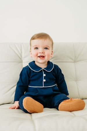 Maddie & Connor Navy Piped Polo Romper in Navy