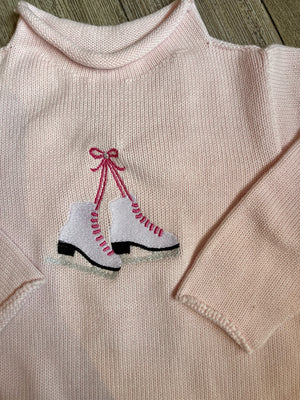 A Soft Idea Roll Neck Sweater in Pink with Ice Skates