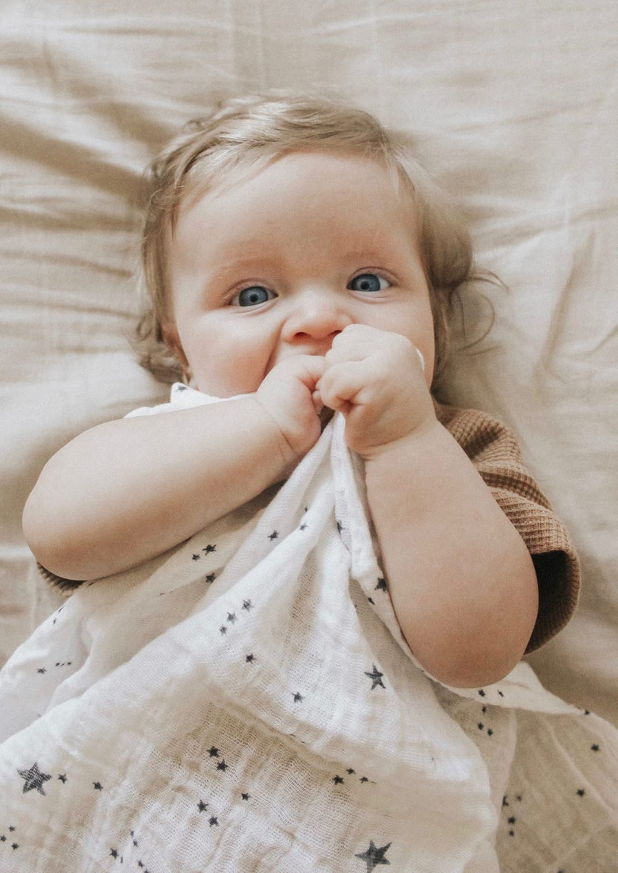 Little Unicorn Cotton Muslin Swaddle in Shooting Stars